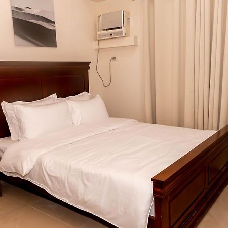 Amora Suites At The Beacon Makati Manila Szoba fotó