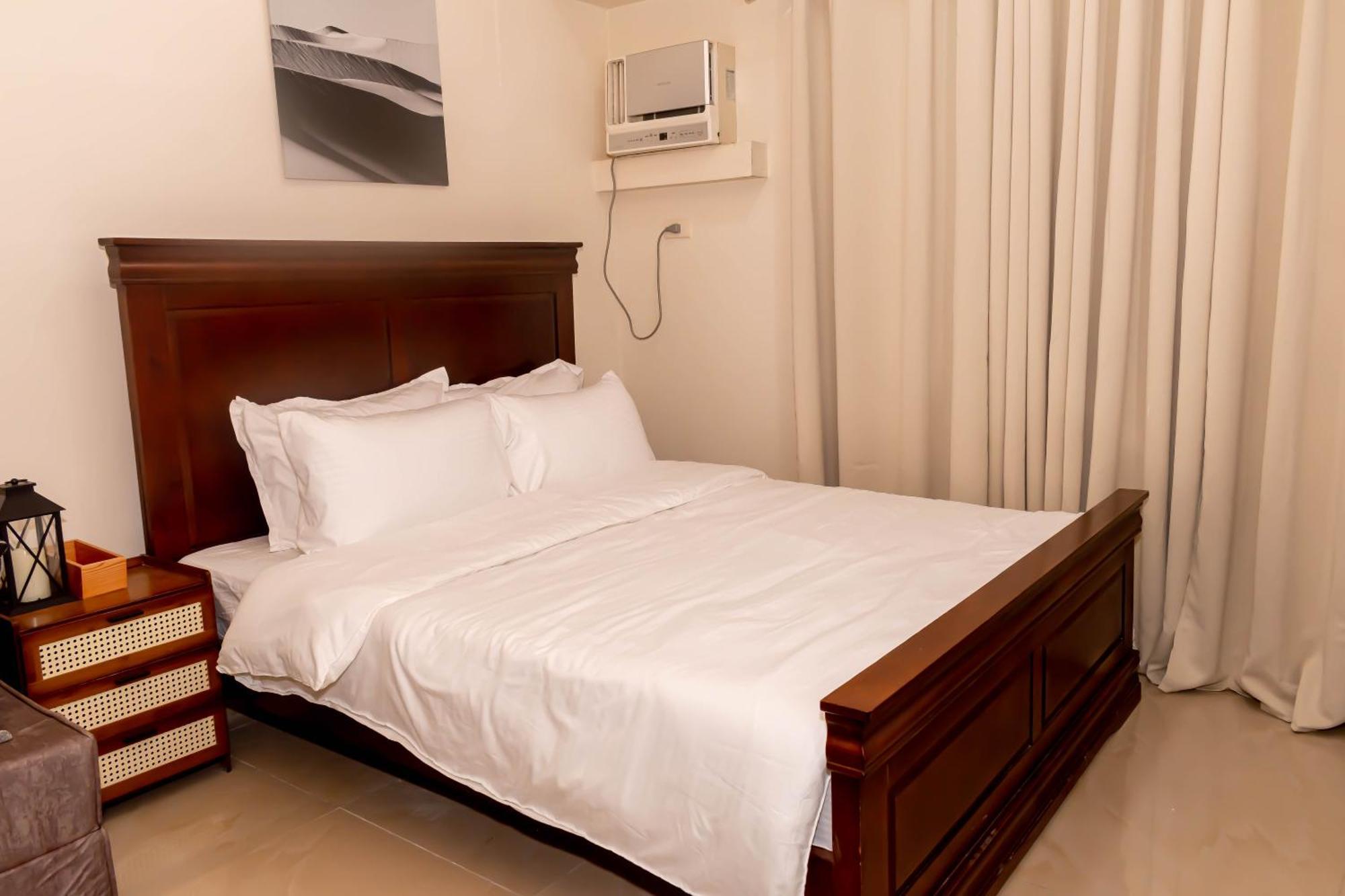 Amora Suites At The Beacon Makati Manila Szoba fotó